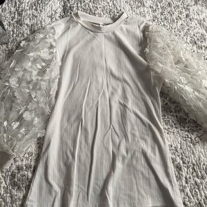 White top with puffy floral sleeves